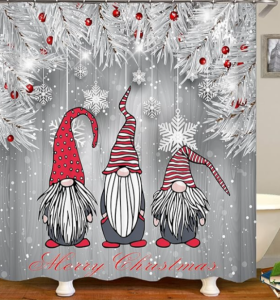 A shower curtain with three fanciful Christmas gnomes and snowflakes